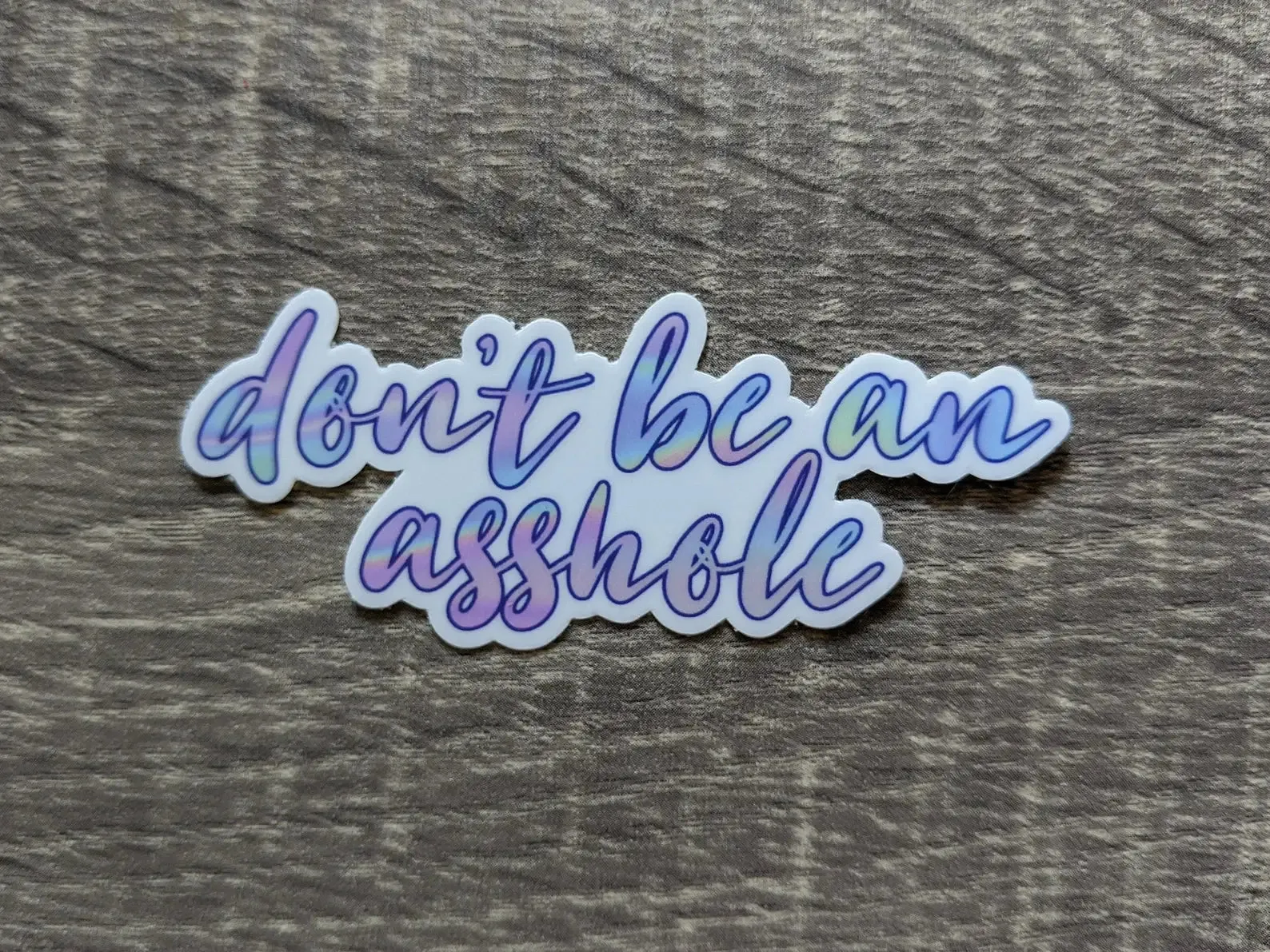 Don't be an asshole cursive vinyl sticker: Holographic